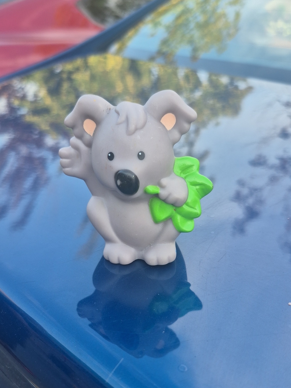 Gray Koala Chew Toy for Small Pets with Bright Green Leaf